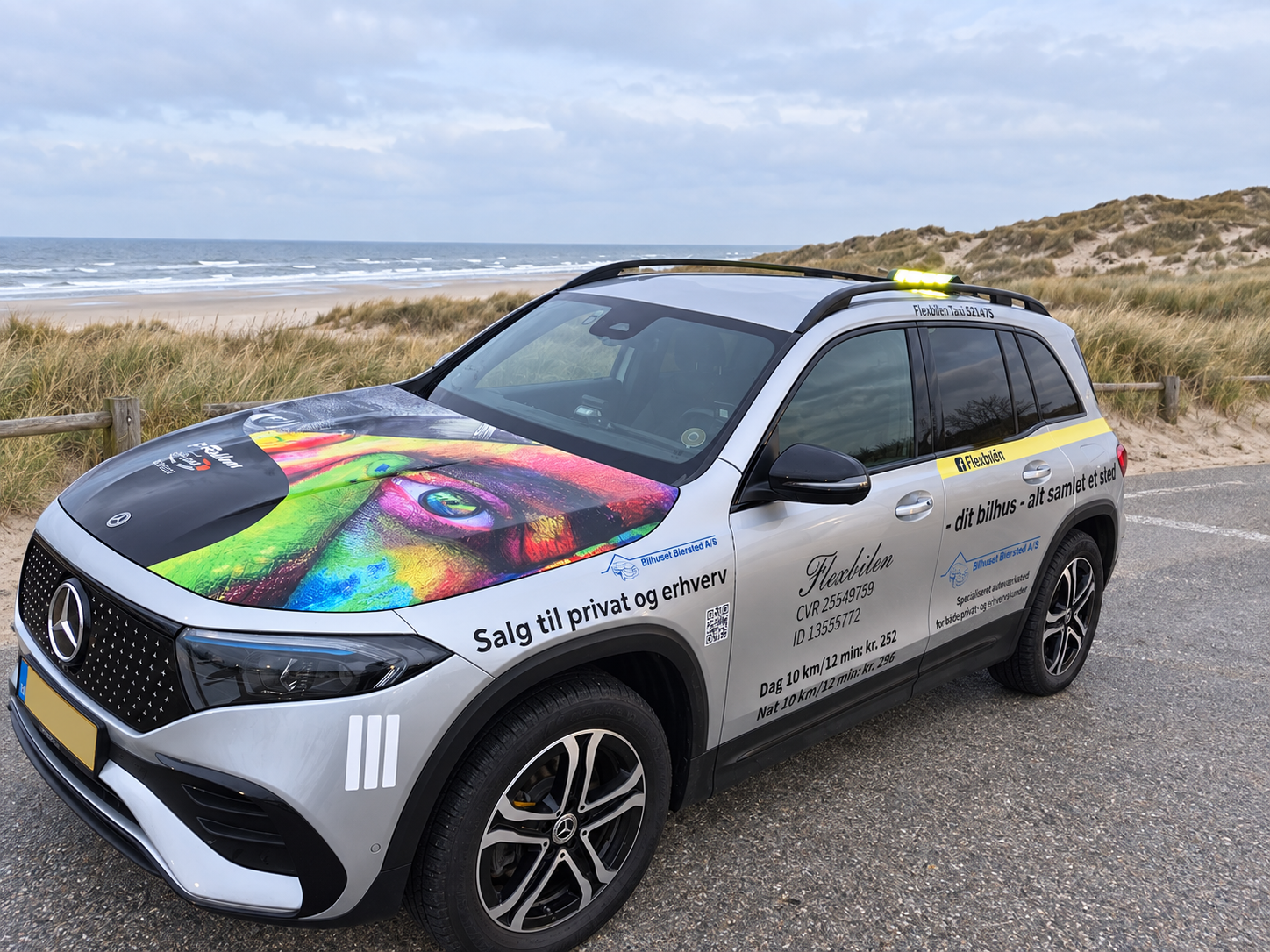 Flexbilen Taxas Mercedes ved de nordjyske klitter